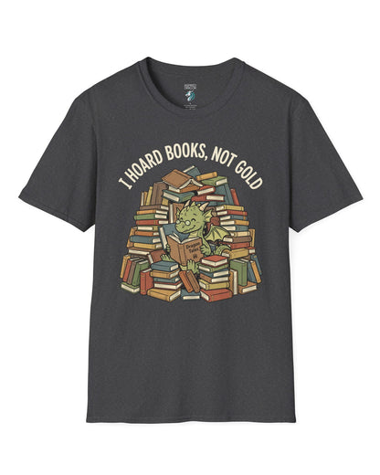 I Hoard Books, Not Gold shirt in dark heather featuring a book-loving green dragon nestled in a towering hoard of books