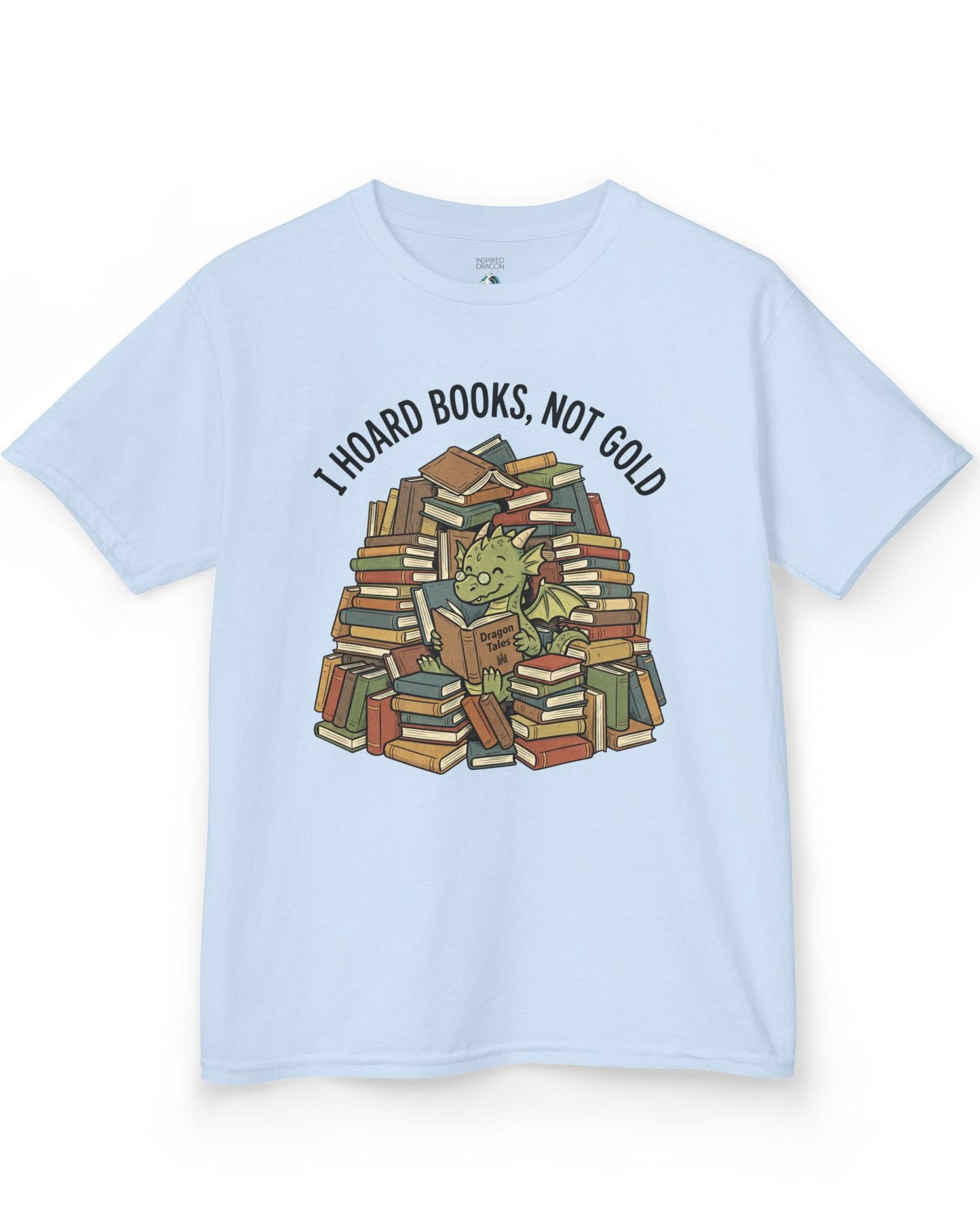 I Hoard Books, Not Gold shirt in light blue featuring a book-loving green dragon nestled in a towering hoard of books