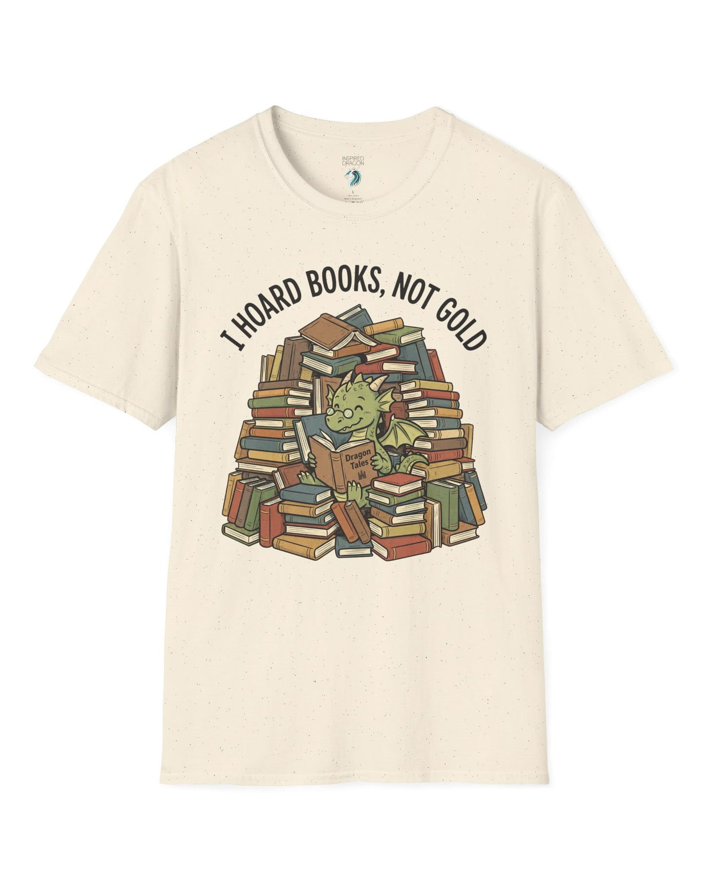 I Hoard Books, Not Gold shirt in natural featuring a book-loving green dragon nestled in a towering hoard of books