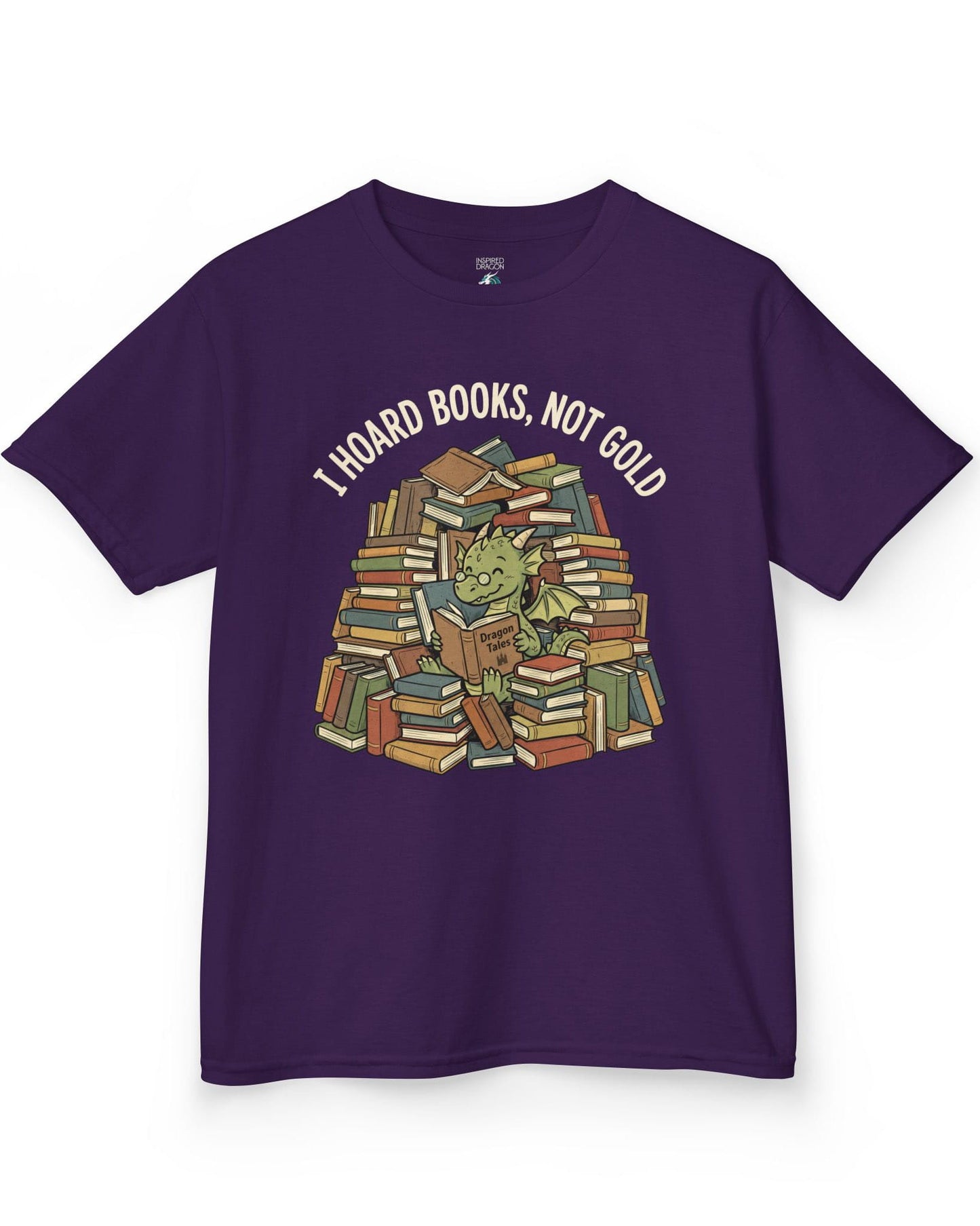 I Hoard Books, Not Gold shirt in purple featuring a book-loving green dragon nestled in a towering hoard of books