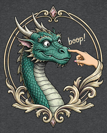 The Golden Boop shirt in dark heather featuring a wide-eyed green dragon getting its nose booped by a feminine hand