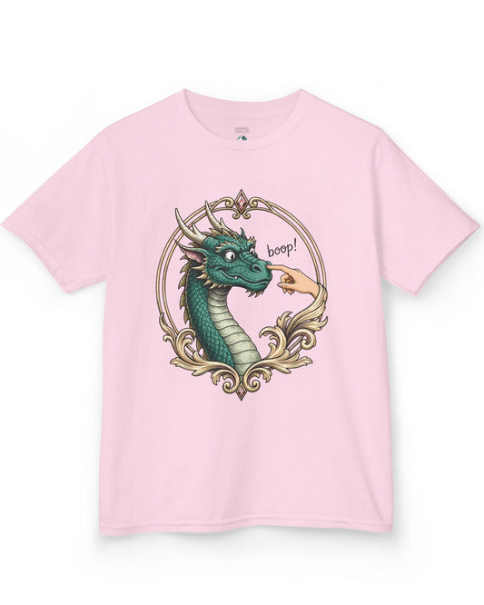 The Golden Boop shirt in light pink featuring a wide-eyed green dragon getting its nose booped by a feminine hand