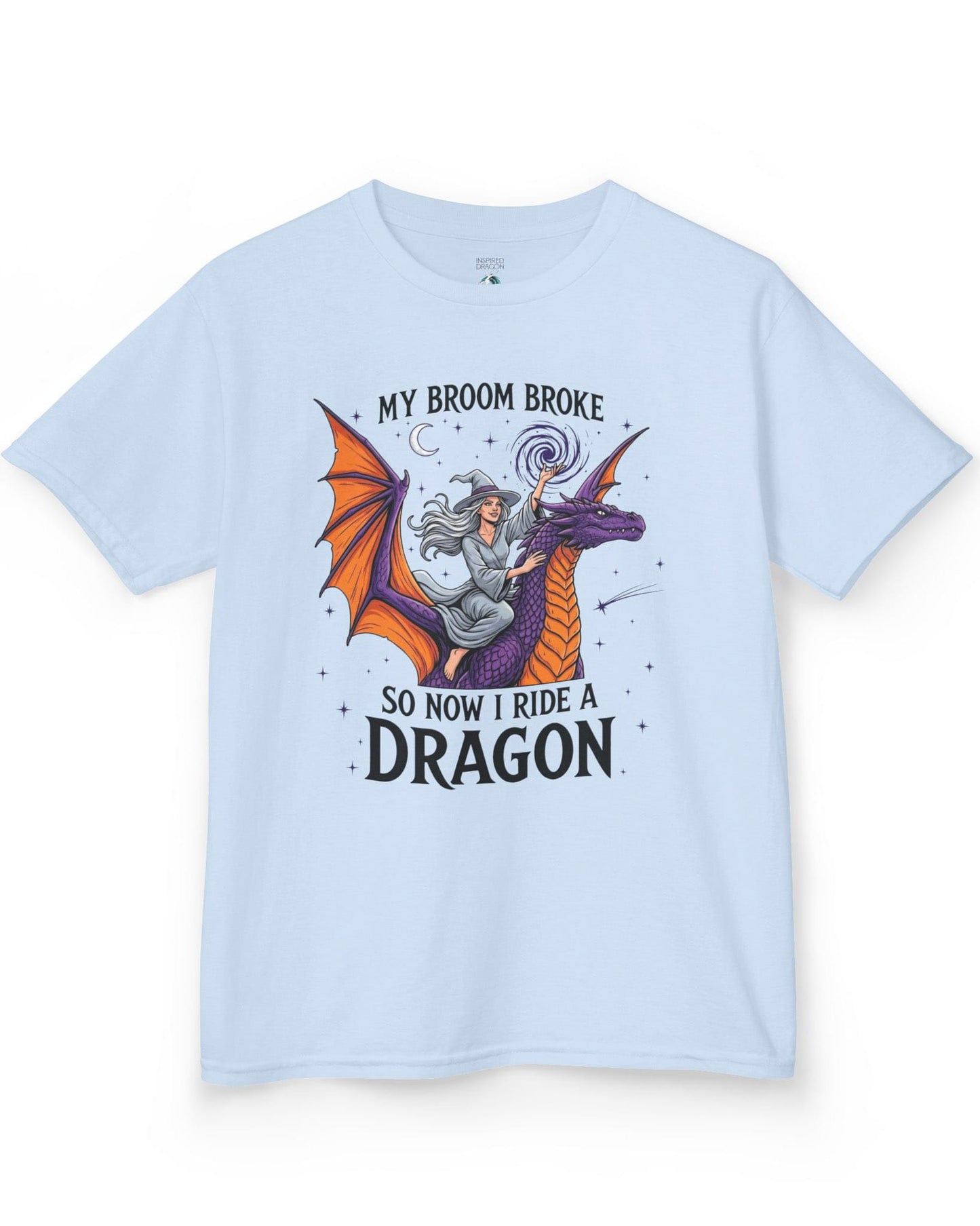 My Broom Broke Magical shirt in light blue featuring a magical witch riding a purple dragon beneath a starry night sky