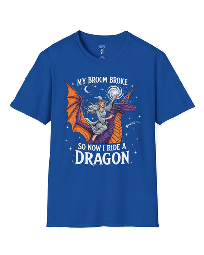 My Broom Broke Magical shirt in royal blue featuring a magical witch riding a purple dragon beneath a starry night sky