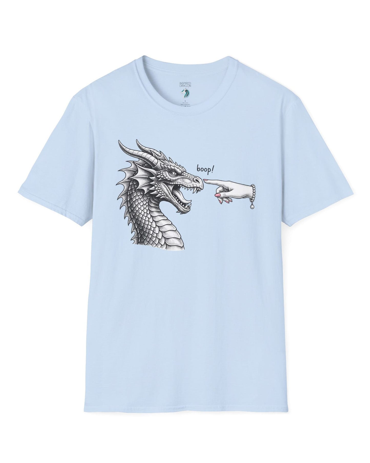 Boop in Pink shirt in light blue featuring a black and white dragon getting its nose booped by a hand with pink nails