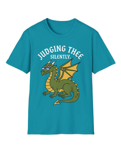 Judging Thee Silently shirt in tropical blue featuring a judgmental green dragon with glasses, folded wings, and text