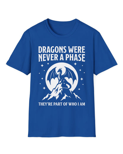 Dragons Were Never a Phase shirt in royal blue featuring a white dragon silhouette, mountains, stars, and bold text