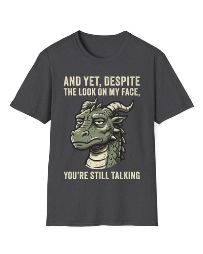 You're Still Talking shirt in dark heather featuring a weary green dragon and distressed text