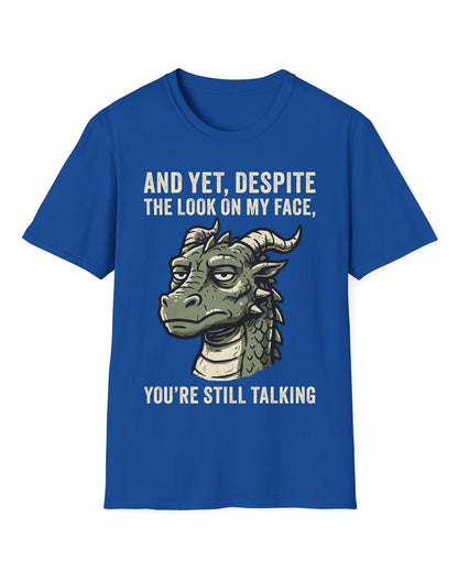 You're Still Talking shirt in royal blue featuring a weary green dragon and distressed text