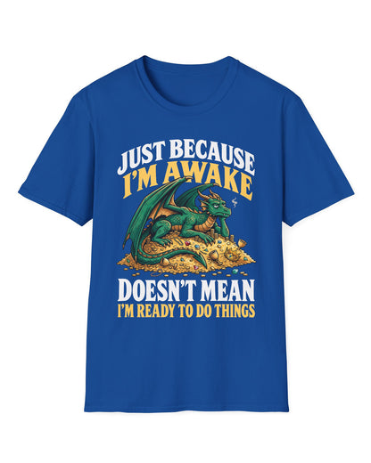 Just Because I'm Awake shirt in royal blue featuring a sleepy green dragon lounging on a pile of gold beneath bold text