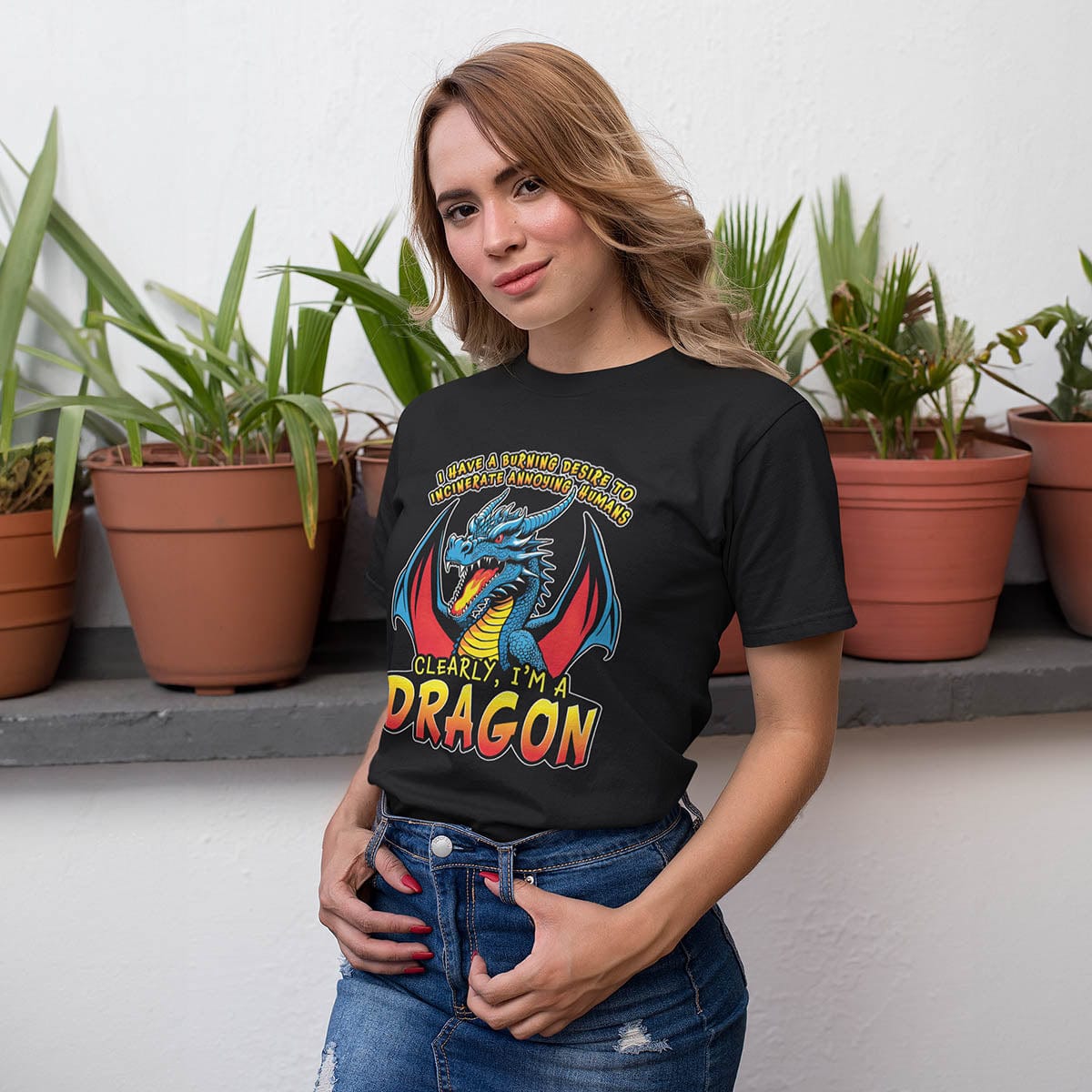 Woman wearing a Funny Dragon Shirt that says: I HAVE A BURNING DESIRE TO INCINERATE ANNOYING HUMANS / CLEARLY, I’M A DRAGON.